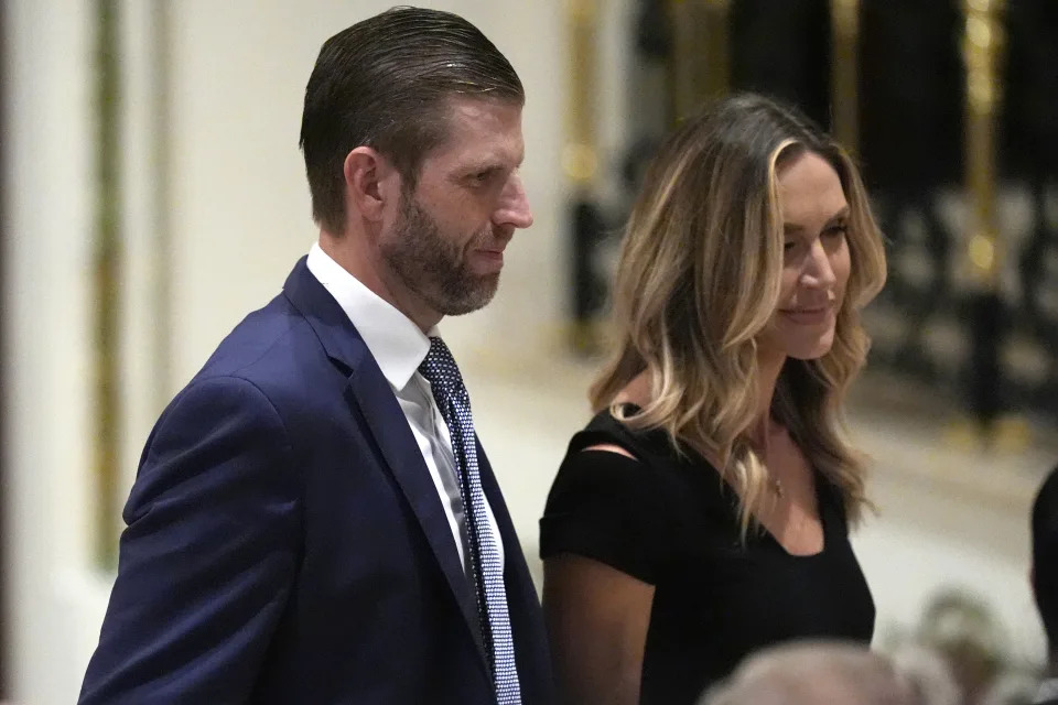 Eric Trump, left, and his wife Lara Trump attend a Super Tuesday election night party before Republican presidential candidate former President Donald Trump speaks at , Tuesday, March 5, 2024, at Mar-a-Lago in Palm Beach, Fla. (AP Photo/Rebecca Blackwell)